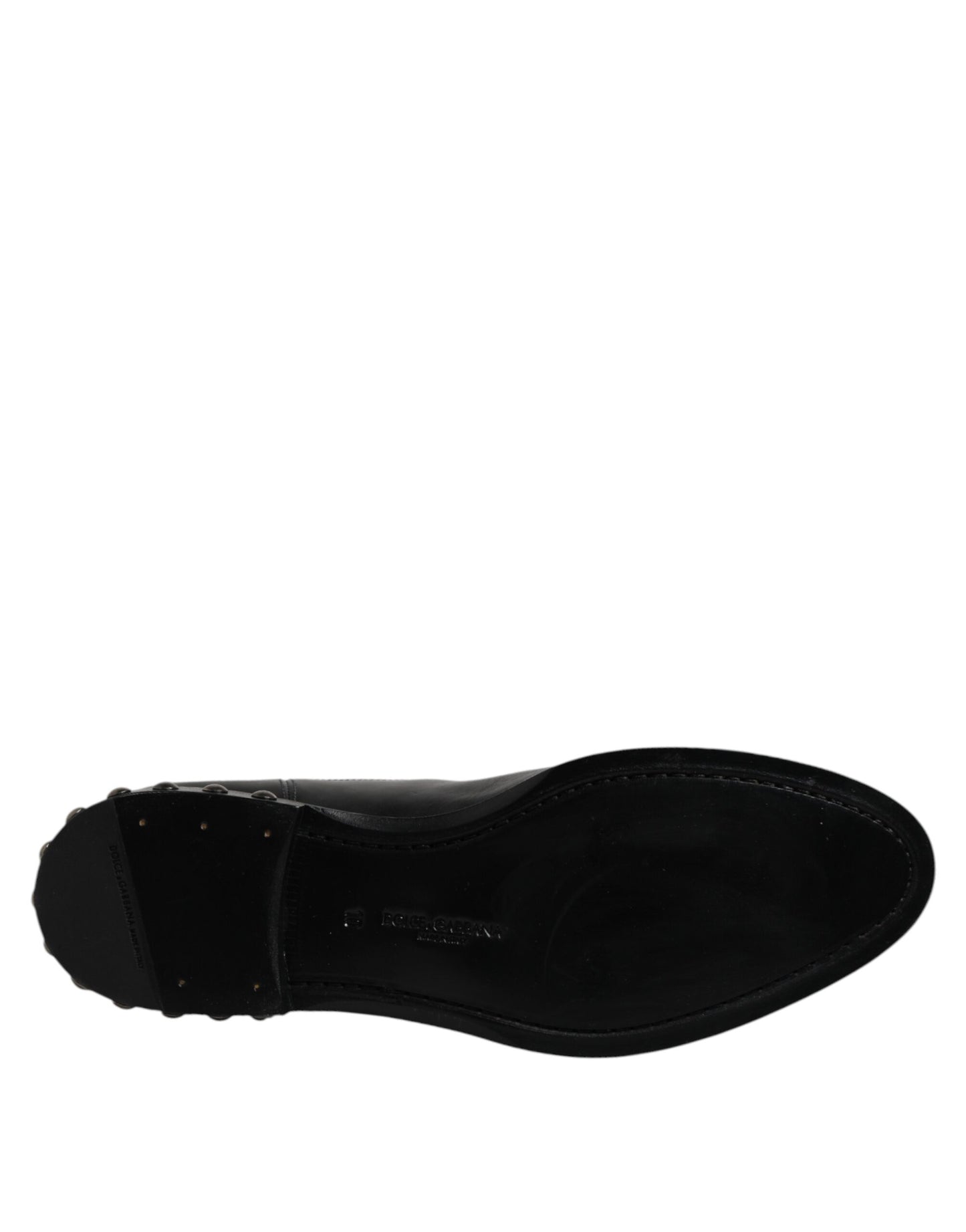 حذاء دولتشي آند غابانا أسود من الجلد بشعار ومرصع بالمسامير