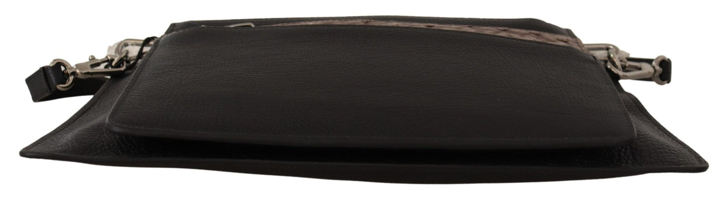 حقيبة ألتا سارتوريا من دولتشي آند غابانا، سوداء اللون، مصنوعة من الجلد الفاخر، ومزوّدة بحزام للكتف