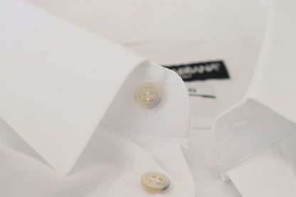 قميص دولتشي آند غابانا الرسمي المصنوع من القطن الأبيض والمزين بريش الطاووس باللون الذهبي