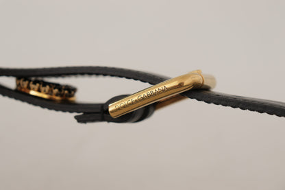 حزام دولتشي آند غابانا المصنوع من الجلد الأسود والمزين بشعار الكريستال