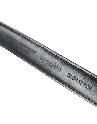 حزام دولتشي آند غابانا الأسود والأبيض المرقع بمشبك معدني ذهبي