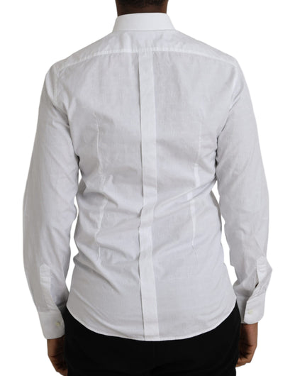 فستان دولتشي آند غابانا أبيض من القطن بأكمام طويلة وقميص ذهبي