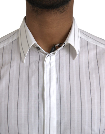 فستان رسمي مخطط باللونين الأسود والأبيض من دولتشي آند غابانا، قميص ذهبي