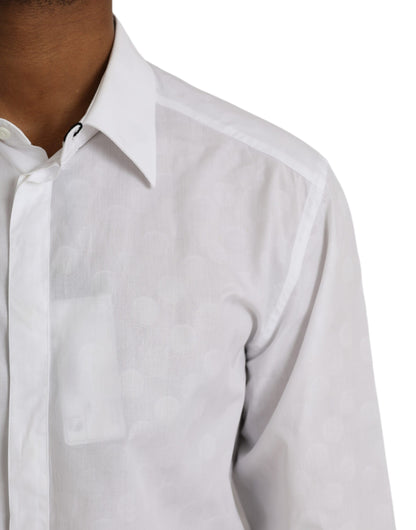 فستان قطني أبيض منقط من دولتشي آند غابانا، قميص ذهبي