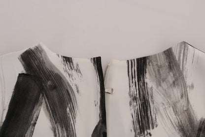 بلوزة دولتشي آند غابانا بيضاء مخططة مطبوعة باللونين الأبيض والأسود