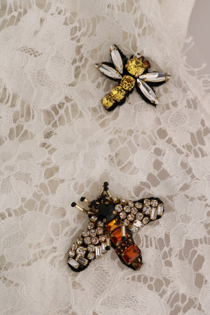 بلوزة دولتشي آند غابانا البيضاء المزينة بالكريستال من الدانتيل