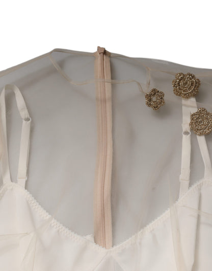 فستان دولتشي آند غابانا أبيض شفاف من التول وصدرية ضيقة متوسط ​​الطول