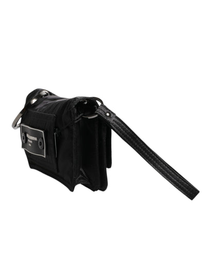 حقيبة كروس بودي من دولتشي آند غابانا، مصنوعة من القماش الأسود، بشعار ثنائي الاتجاه