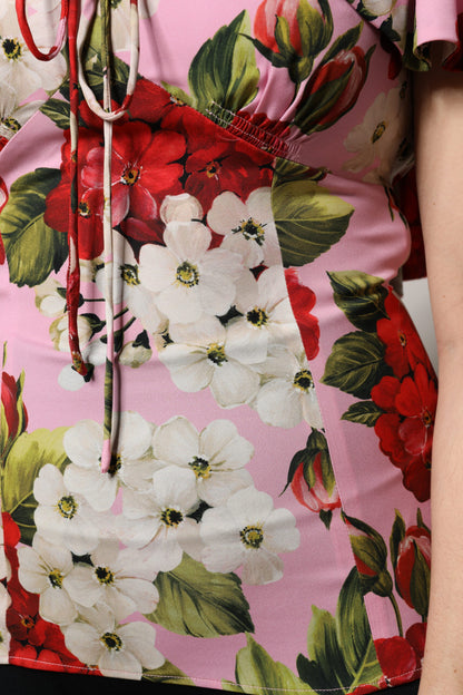 بلوزة دولتشي آند غابانا الوردية المزخرفة بالأزهار من الحرير بأكمام قصيرة