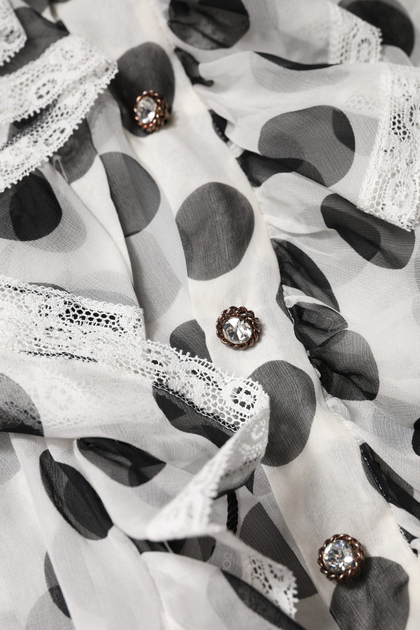 بلوزة دولتشي آند غابانا بدون أكمام من القطن باللونين الأبيض والأسود