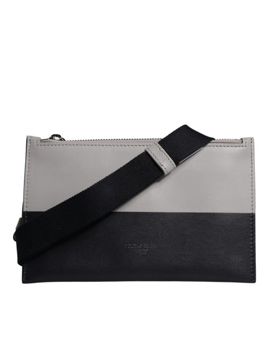 حقيبة كروس بودي من دولتشي آند غابانا، من الجلد الأسود والأبيض، منقوش عليها شعار دولتشي آند غابانا