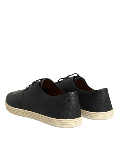 حذاء سنيكرز دولتشي آند غابانا أسود من الجلد منخفض الرقبة بتصميم تاج النحل