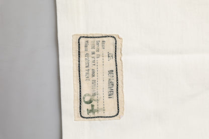 تي شيرت رجالي قطني أبيض من دولتشي آند غابانا بياقة دائرية وطبعة حب السلام