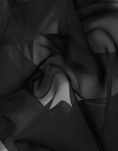 بلوزة دولتشي آند غابانا سوداء شفافة من الحرير والشيفون والدانتيل