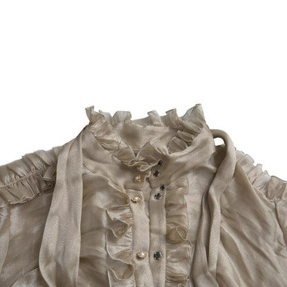 بلوزة دولتشي آند غابانا الذهبية بياقة أسكوت مزينة بالكشكشة