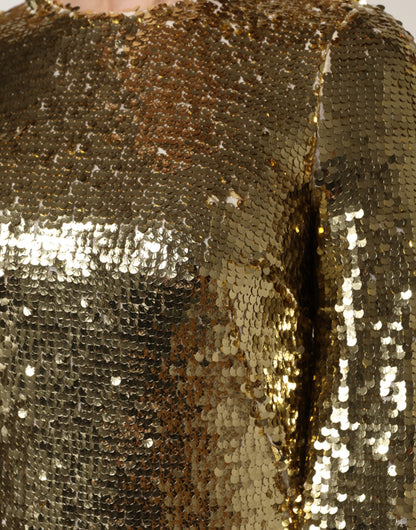 فستان دولتشي آند غابانا الذهبي المزين بالترتر بأكمام طويلة