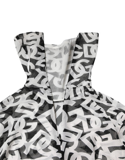 بلوزة دولتشي آند غابانا بيضاء بأكمام طويلة وياقة مدورة وشعار DG