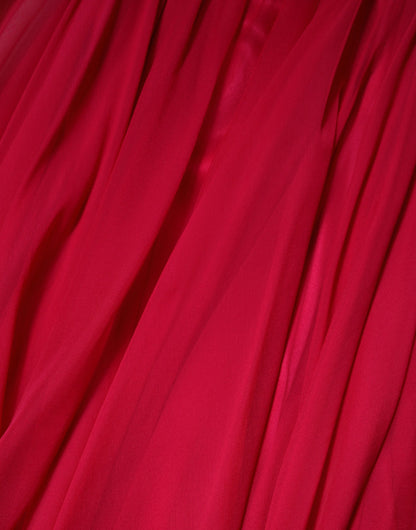 فستان دولتشي آند غابانا الوردي المزين بالحرير متوسط ​​الطول