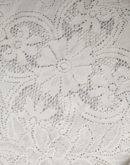بلوزة دولتشي آند غابانا القطنية المطرزة بالدانتيل باللون الأبيض
